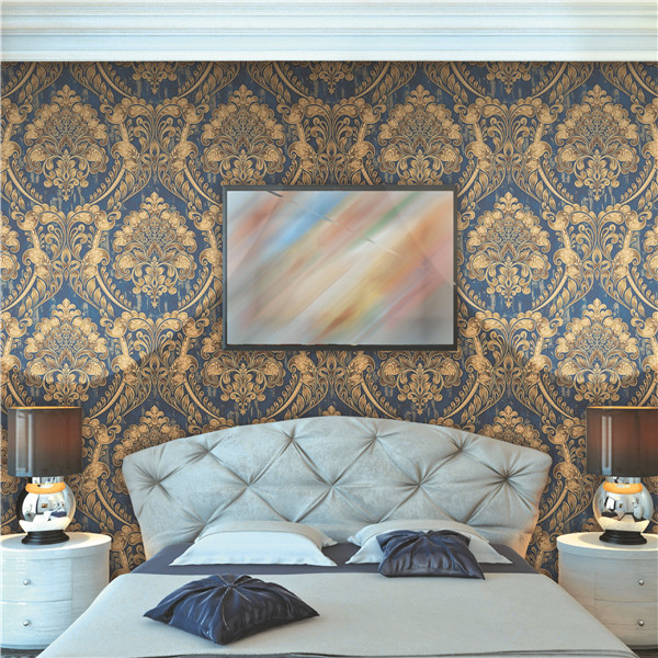 Blue and gold damask master bedroom feature wall