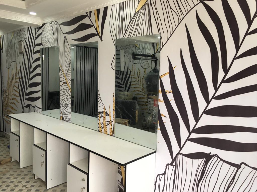 Made to measure abstract black and white banana leaf wallpaper mural.
