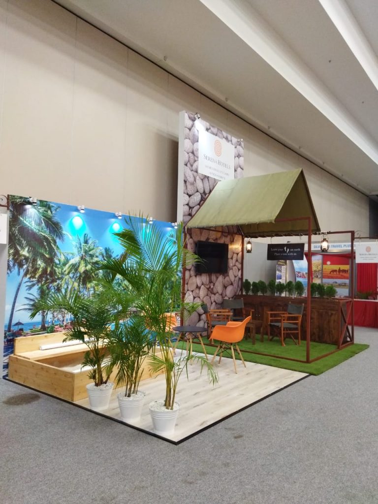 Hotel exhibition stand green mural by Wallpaper Kenya