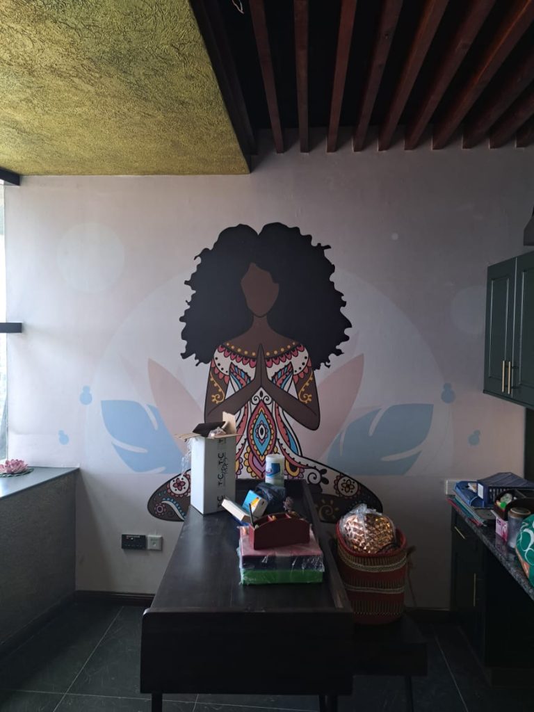 African dress fabric company office wall mural